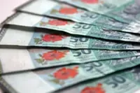 Ringgit mostly higher against major, regional currencies, slips against US dollar